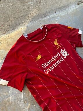 New Balance Red Liverpool FC Pinstripe Jersey with Gold Accents